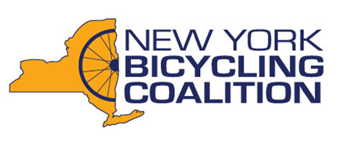 New York Bicycling Coalition logo in color with outside of NY State in orange, with half a bicycle spoked wheel superimposed.