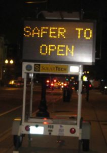 a1_safer-to-open-somervillema-sign