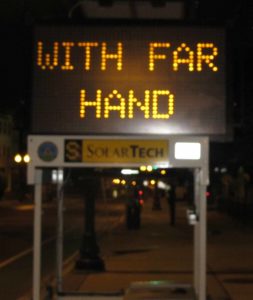 a3_with-far-hand-somervillema-sign