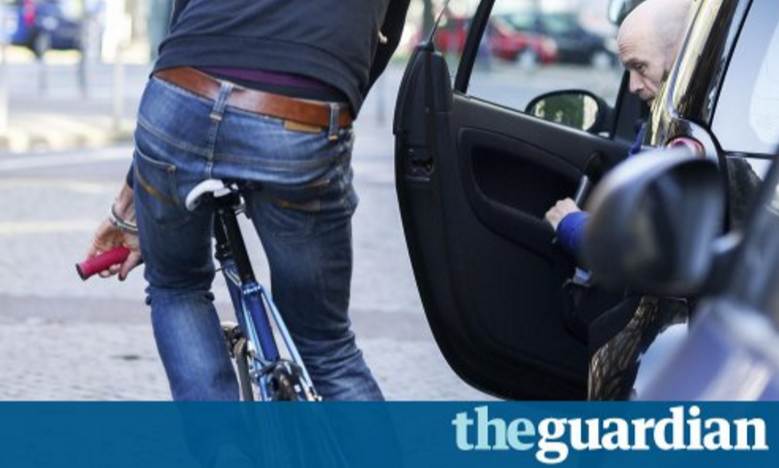 Photo from The Guardian article 11 Sept. 2017 on anti dooring campaign promoting the Dutch Reach by a charity founded by parents of Sam Boulton of Leicester who died when a carelessly opened car door caused fatal collision. 