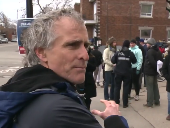 Montreal bike safety activist Geoffrey Bush of Une Porte Une Vie demonstrates far hand method near conclusion of CTV News video at right.