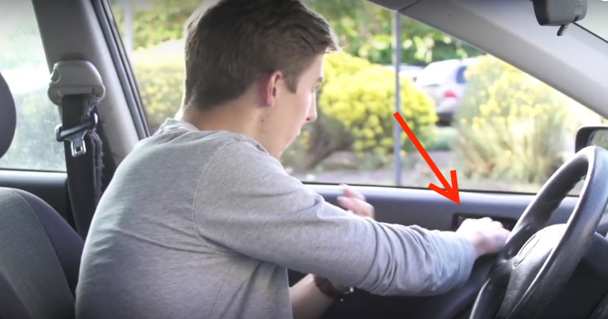 Photo: Young male driver seen reaching across with far hand (right for right side of road dirvers) to open car door latch, initiating Dutch Reach anti dooring maneuver.