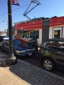 Street car doored by auto in Washington, D.C. Feb. 21, 2017. 